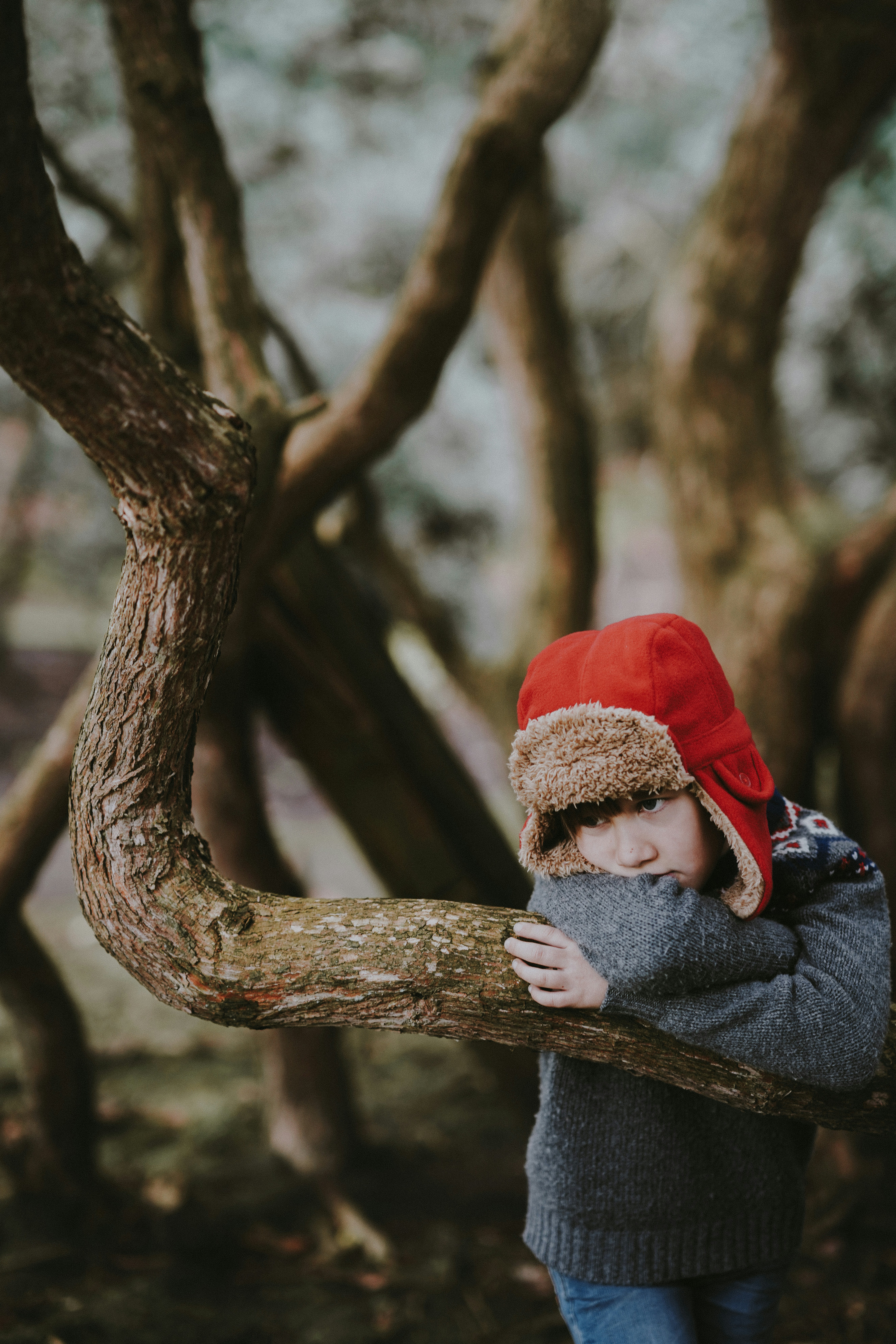 A bored kid in the woods.
